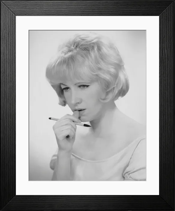 Framed Print : Woman thinking what to write Framed Print : Woman thinking what to write