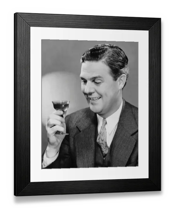 Framed Print : Man looking at drink Framed Print : Man looking at drink