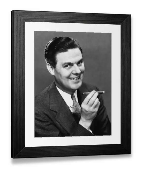 Framed Print : Businessman smoking cigar Framed Print : Businessman smoking cigar