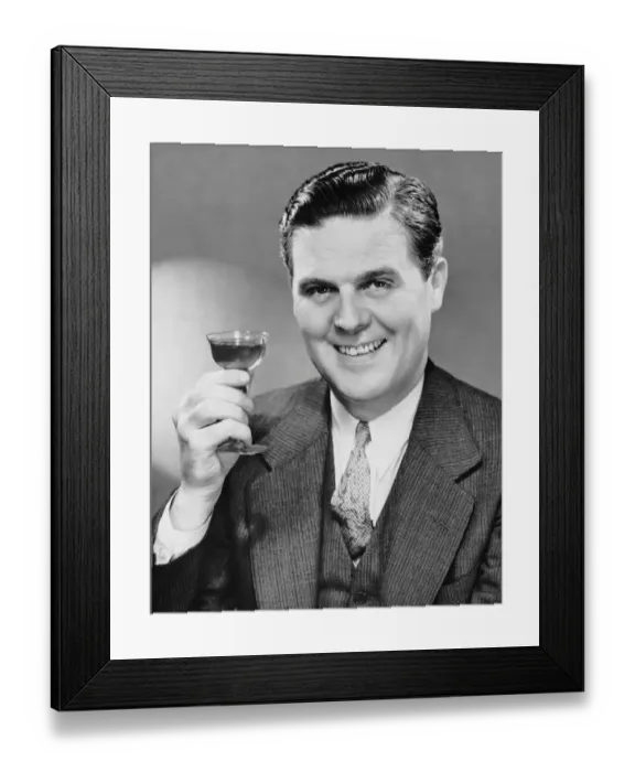 Framed Print : Man holding drink Framed Print : Man holding drink