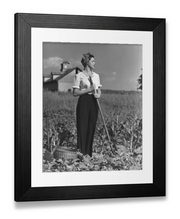 Framed Print : Woman in vegetable garden
