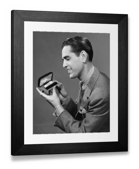 Framed Print : Man looking at watch in box Framed Print : Man looking at watch in box