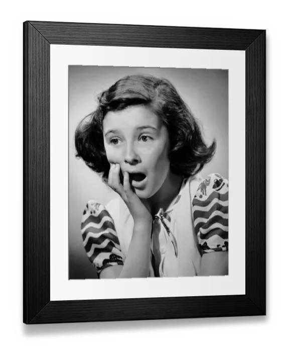 Framed Print : Young girl looking shocked Framed Print : Young girl looking shocked
