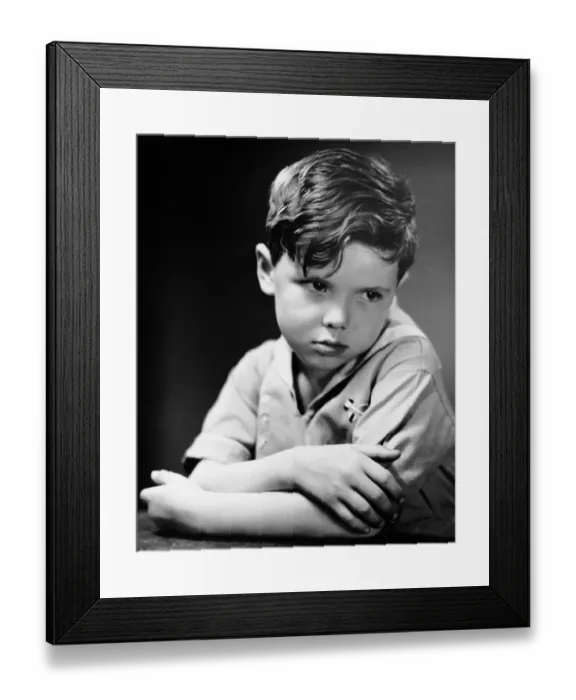 Framed Print : Young boy pouting Framed Print : Young boy pouting