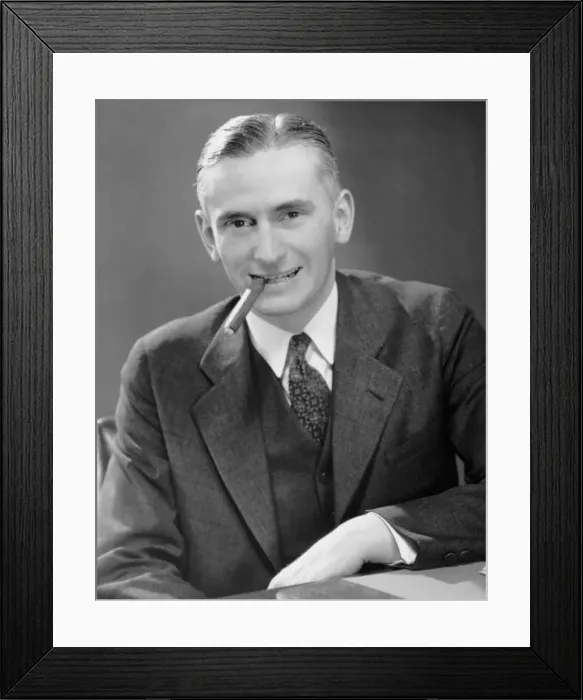 Framed Print : Executive smoking cigar Framed Print : Executive smoking cigar