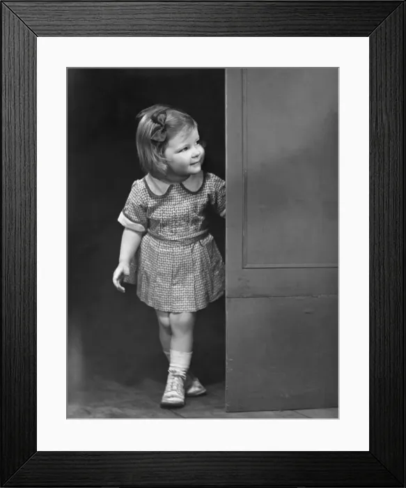Framed Print : Girl coming outside Framed Print : Girl coming outside