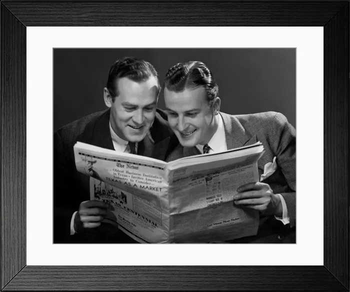 Framed Print : Two businessmen reading newspaper Framed Print : Two businessmen reading newspaper