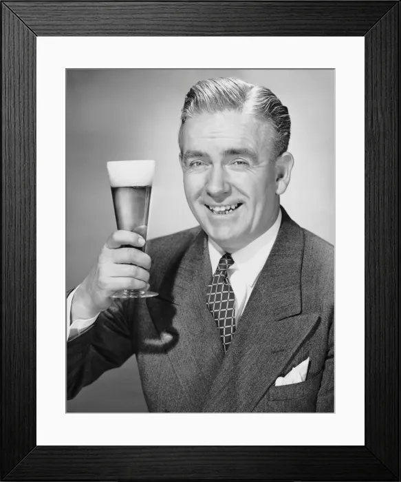 Framed Print : Mature businessman w / beer Framed Print : Mature businessman w / beer