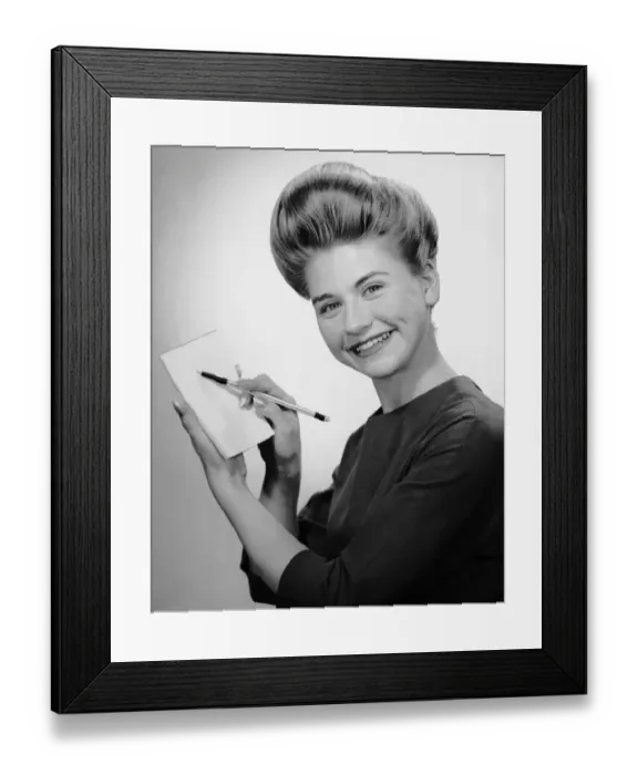 Framed Print : Woman smiling w / pen & pad Framed Print : Woman smiling w / pen & pad
