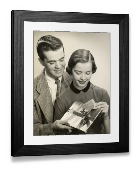 Framed Print : Couple opening gift Framed Print : Couple opening gift