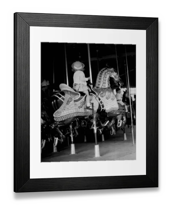 Framed Print : Girl riding a carousel Framed Print : Girl riding a carousel