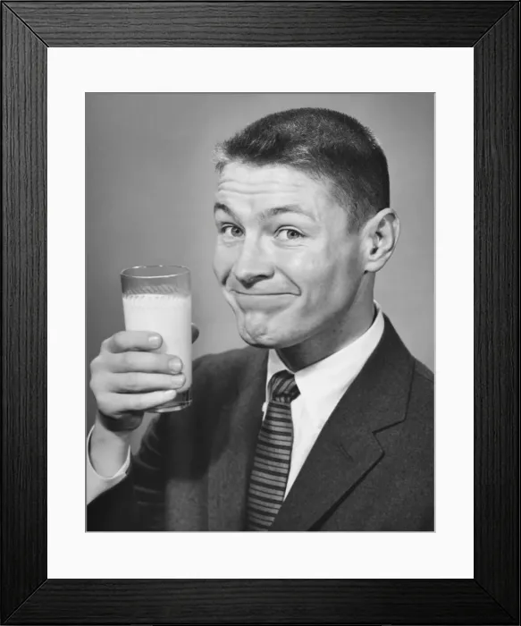 Framed Print : Man having a glass of milk Framed Print : Man having a glass of milk