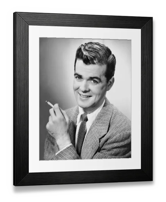 Framed Print : Portrait of man holding a cigarette Framed Print : Portrait of man holding a cigarette