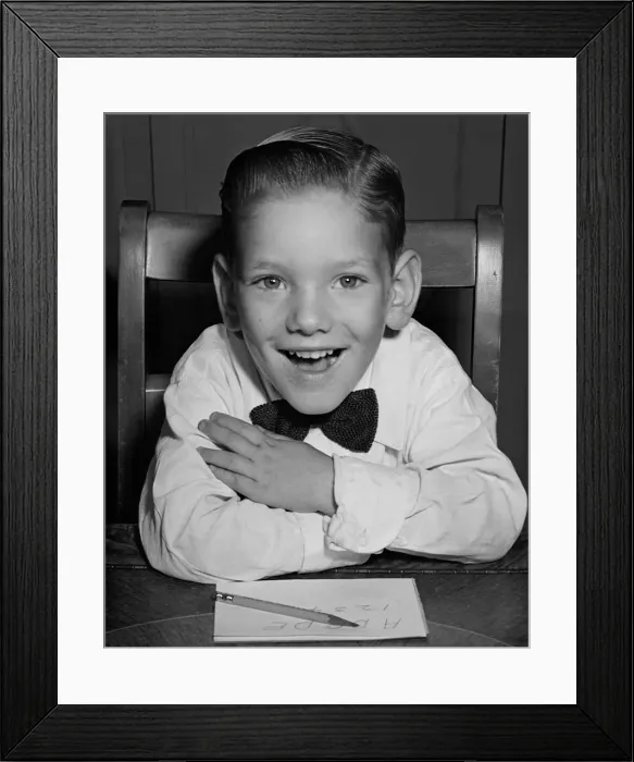 Framed Print : Schoolboy at desk Framed Print : Schoolboy at desk