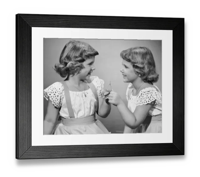 Framed Print : Twin sisters making a wish Framed Print : Twin sisters making a wish