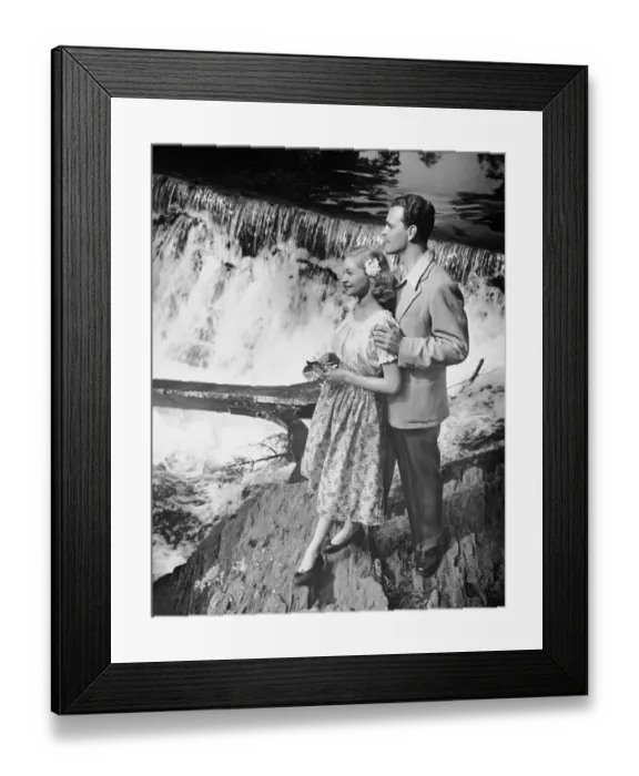 Framed Print : Couple standing near waterfall Framed Print : Couple standing near waterfall