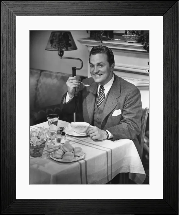 Framed Print : Man having dinner Framed Print : Man having dinner