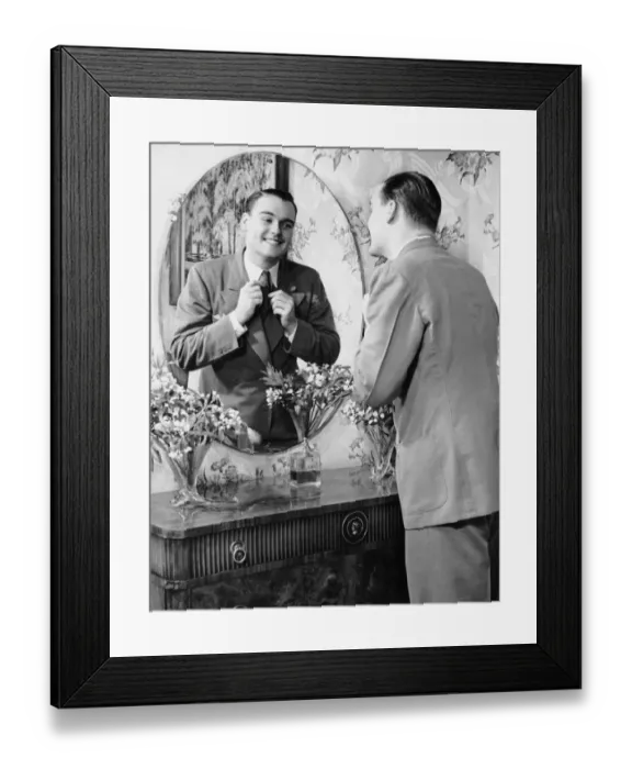 Framed Print : Man checking himself out in mirror Framed Print : Man checking himself out in mirror