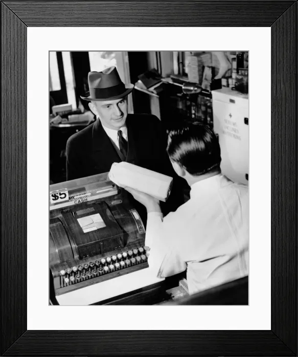 Framed Print : Man picking up prescription in pharmacy Framed Print : Man picking up prescription in pharmacy