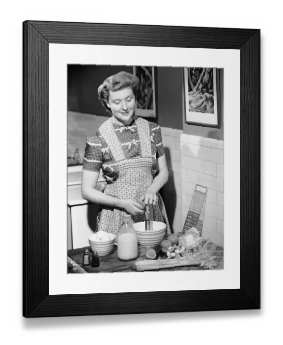 Framed Print : Woman mixing ingredients in bowl Framed Print : Woman mixing ingredients in bowl