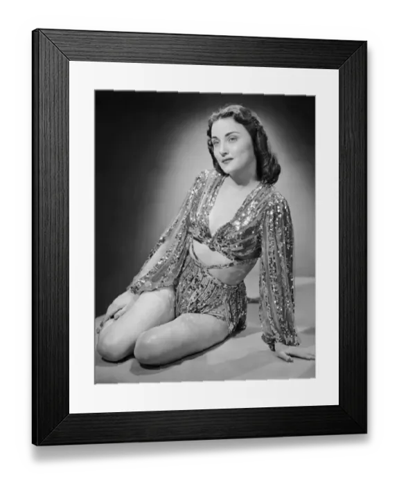 Framed Print : Portrait of woman in lame outfit