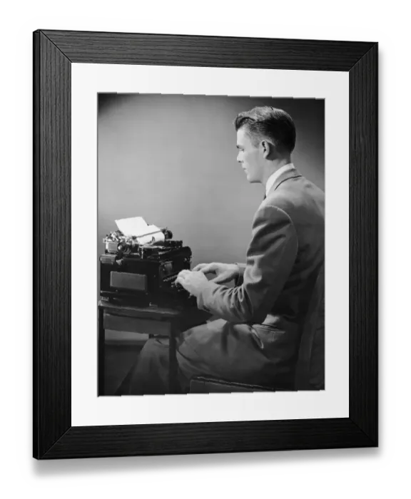 Framed Print : Businessman inside office typing Framed Print : Businessman inside office typing