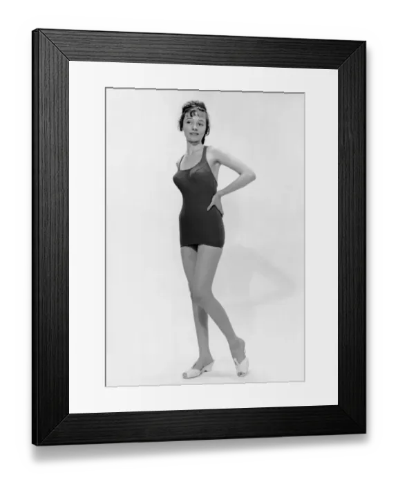 Framed Print : Young woman poses in bathing suit Framed Print : Young woman poses in bathing suit