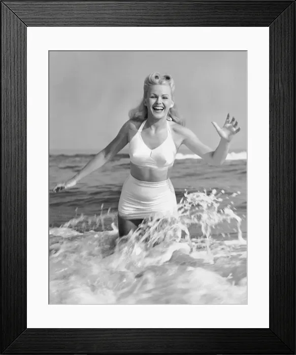 Framed Print : Blonde woman in two piece bathing suit Framed Print : Blonde woman in two piece bathing suit