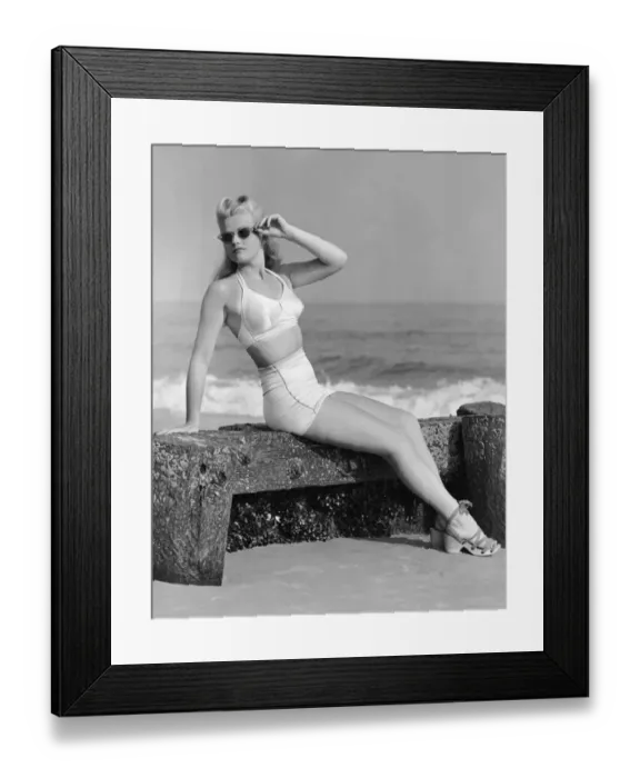 Framed Print : Woman sitting near shore Framed Print : Woman sitting near shore