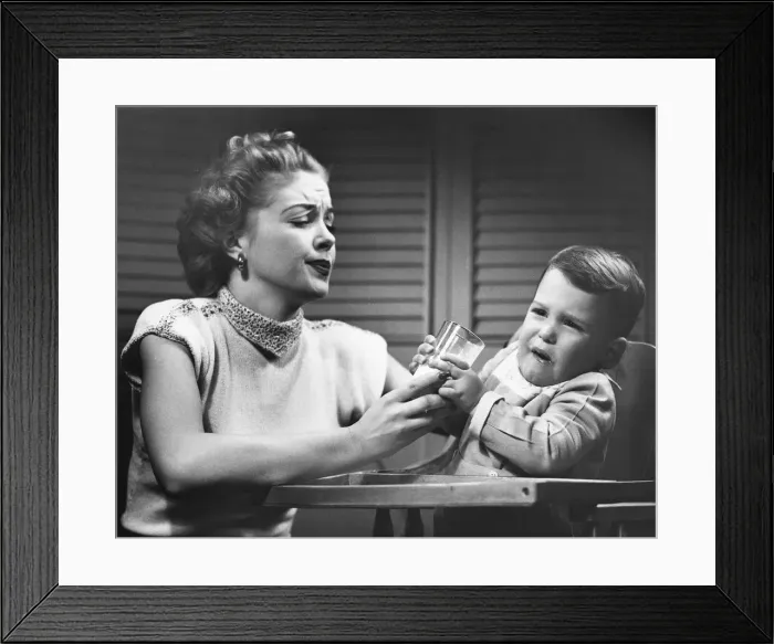 Framed Print : Mother feeding baby Framed Print : Mother feeding baby