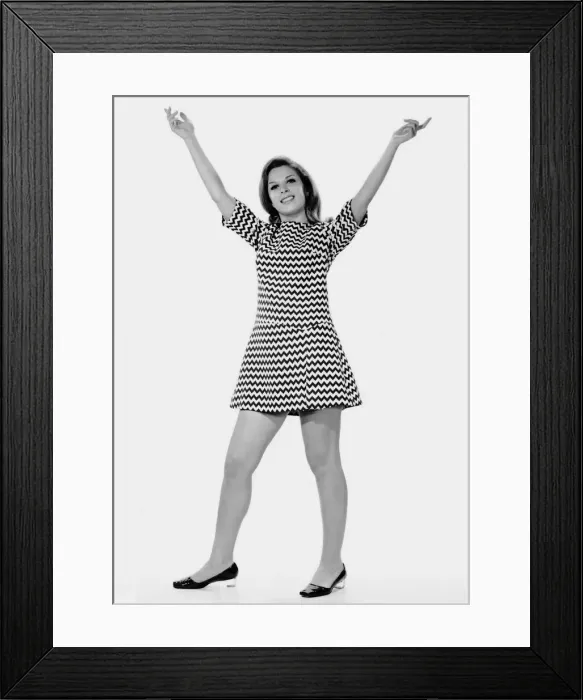Framed Print : Woman holding arms up in the air Framed Print : Woman holding arms up in the air