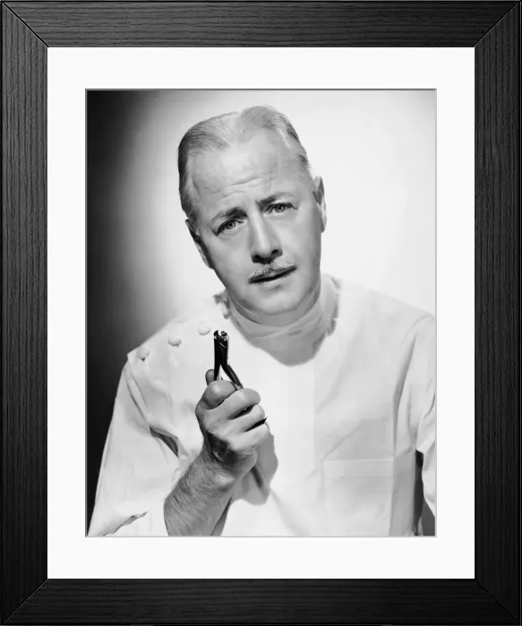 Framed Print : Portrait of dentist with medical instrument Framed Print : Portrait of dentist with medical instrument