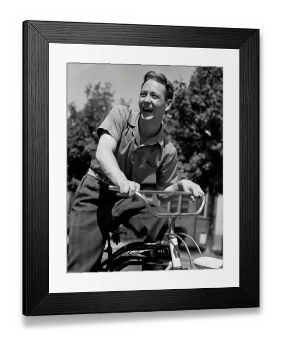 Framed Print : Man bicycling Framed Print : Man bicycling