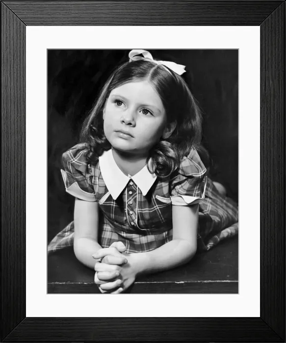 Framed Print : Portrait of girl with hands clasped together Framed Print : Portrait of girl with hands clasped together