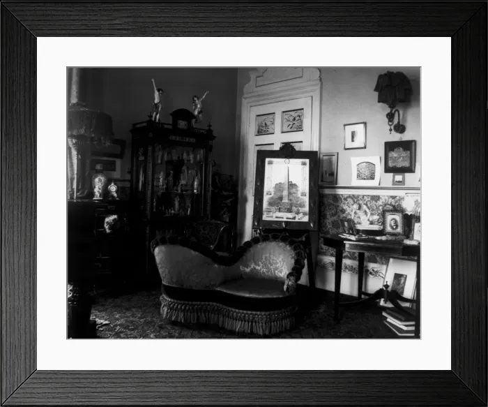 Framed Print : Love Seat. circa 1900: A love seat in a Victorian drawing room