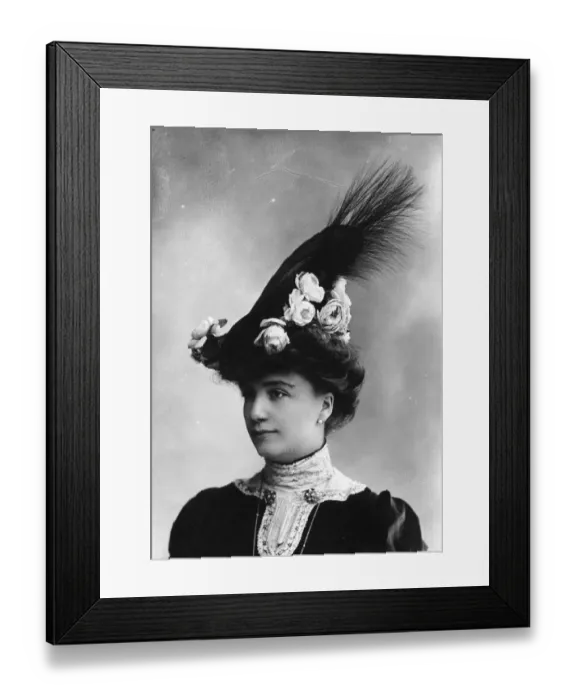 Framed Print : High Hat. circa 1903: An Edwardian woman wearing a high hat, decorated with flowers Framed Print : High Hat. circa 1903: An Edwardian woman wearing a high hat, decorated with flowers