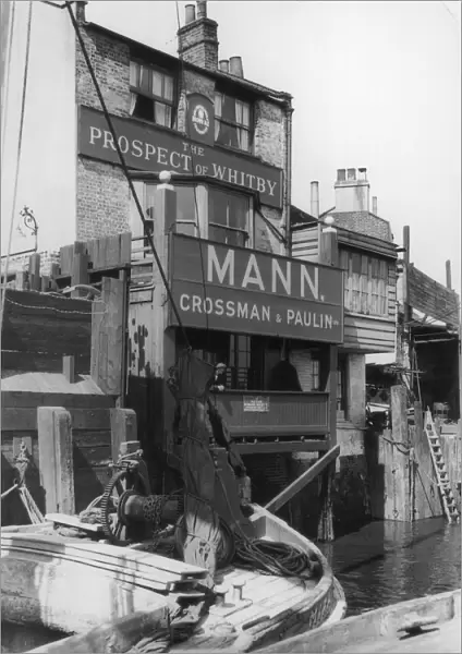 Canal Pub. circa 1900: The Prospect of Whitby public house on the canal at Wapping