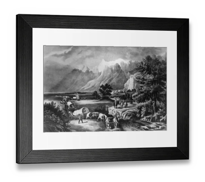 Framed Print : Westward. circa 1850: Emigrants in covered wagons approaching the Rockies Framed Print : Westward. circa 1850: Emigrants in covered wagons approaching the Rockies