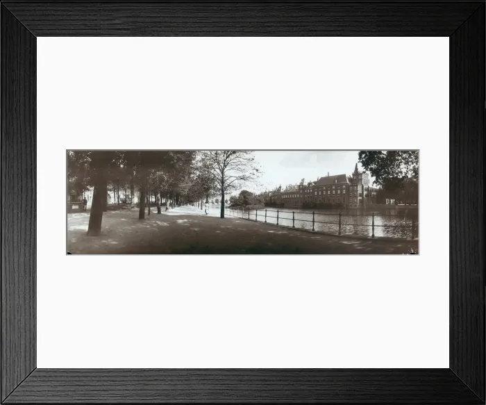 Framed Print : The Hague. A woman walking along a canal in the Hague, circa 1900 Framed Print : The Hague. A woman walking along a canal in the Hague, circa 1900