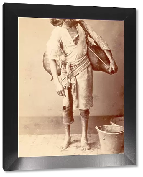 Bhisti. A water carrier or bhisti in India, circa 1870