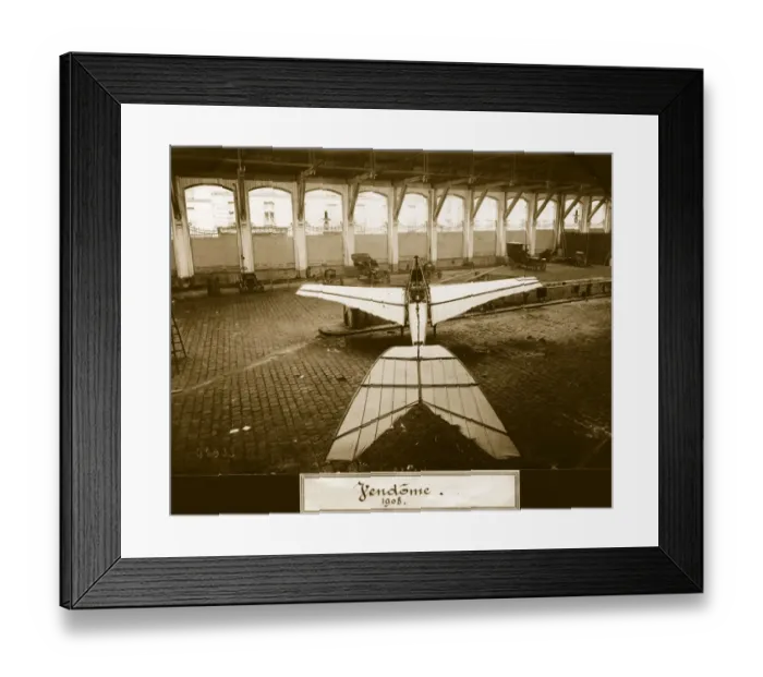 Framed Print : Vendome. A rear view of a Vendome monoplane in a converted stable garage
