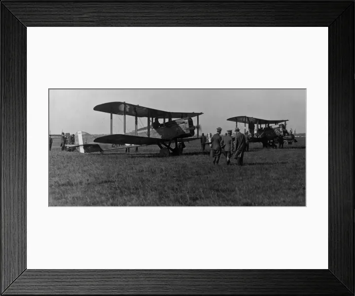 Framed Print : Bi-Planes. circa 1920: Two bi-planes on a airfield getting ready for take-off