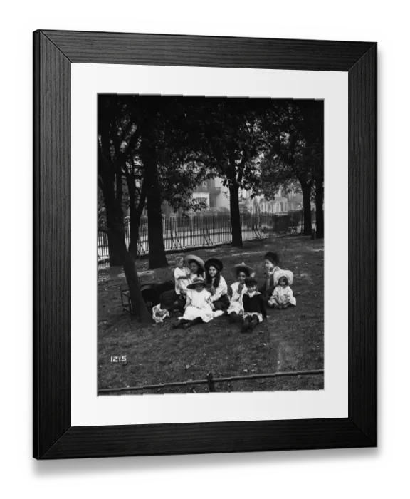 Framed Print : Day Out. 1890: A group of children sitting under a tree in a park, enjoying a day out Framed Print : Day Out. 1890: A group of children sitting under a tree in a park, enjoying a day out