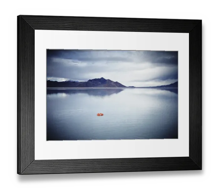 Framed Print : Life ring floating on water under stormy sky Framed Print : Life ring floating on water under stormy sky