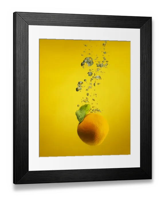 Framed Print : An orange splashed into water