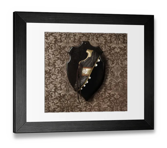 Framed Print : Football boot hanging as a trophy on a wall Framed Print : Football boot hanging as a trophy on a wall