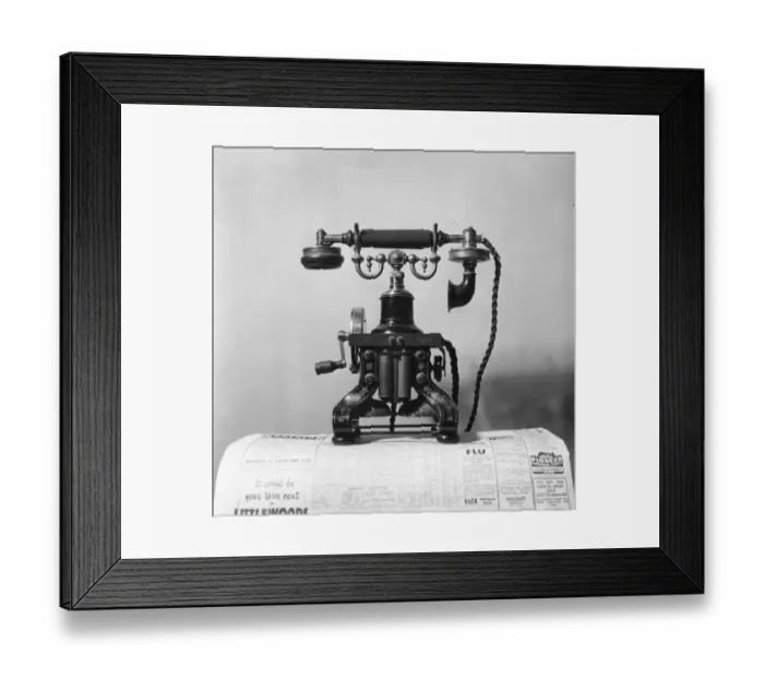 Framed Print : Telephone. 22nd May 1955: An early, crank-handled telephone on display Framed Print : Telephone. 22nd May 1955: An early, crank-handled telephone on display