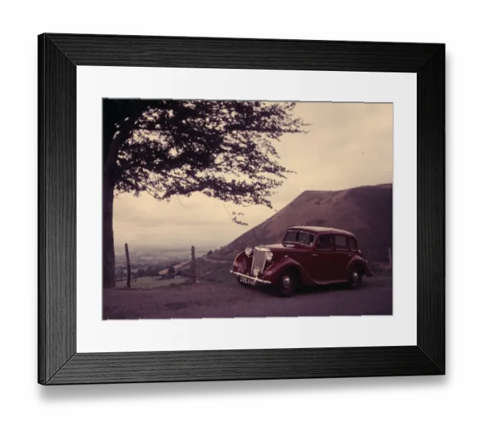 Framed Print : A maroon Triumph Car at a preview of the Motor Show 1952 Framed Print : A maroon Triumph Car at a preview of the Motor Show 1952