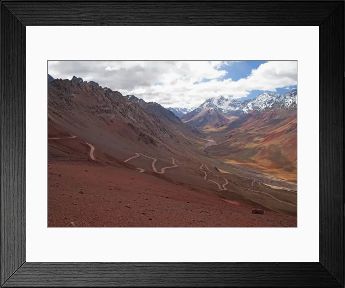 Framed Print : Twisty dirt road on the flank of the Andes Framed Print : Twisty dirt road on the flank of the Andes