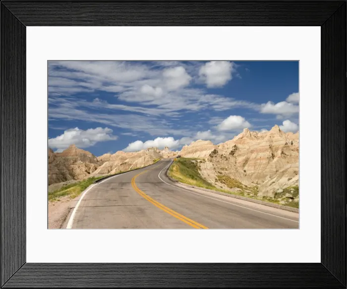 Framed Print : A Road Going Through Badlands National Park Framed Print : A Road Going Through Badlands National Park